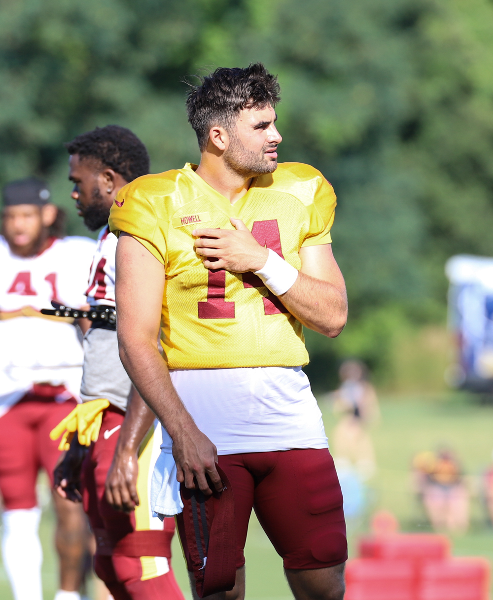 Washington Commanders Quarterback Sam Howell (14) comes to do mo