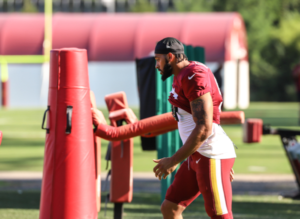 Washington Commanders Montez Sweat (90) warming up with the tack