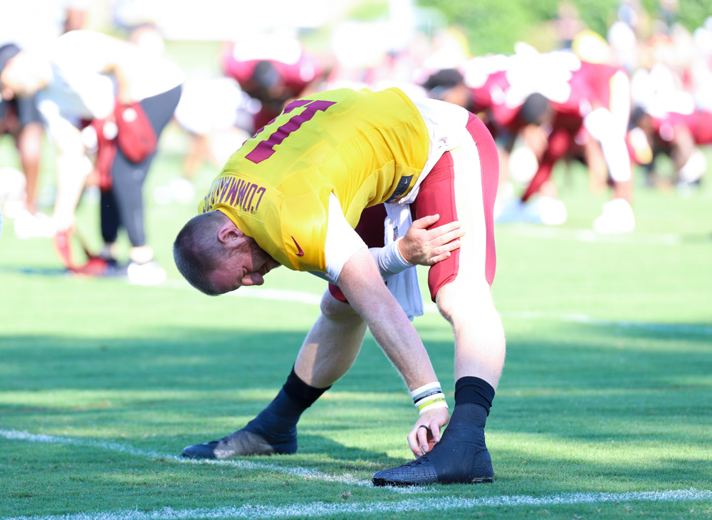 Washington Commanders Quarterback Carson Wentz (11) doing mornin