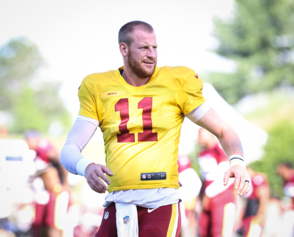Washington Commanders Quarterback Carson Wentz (11) doing mornin