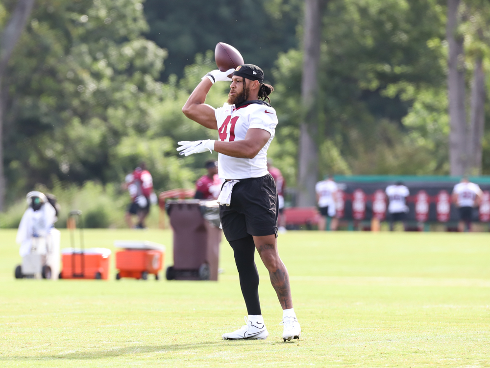 RB Jonathan Williams (41) tosses the ball before practice at the