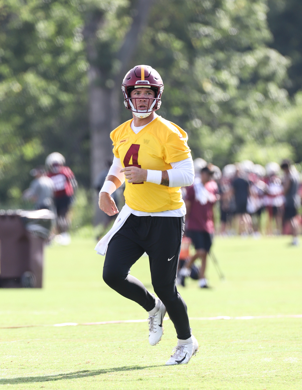 Quarterback Taylor Heinicke (4) watches his throw at the Command