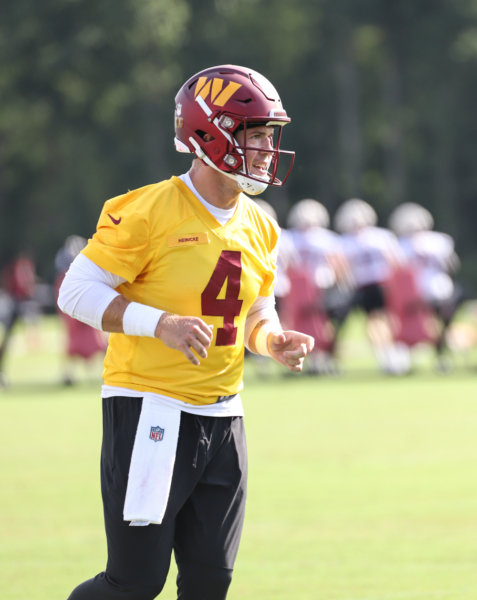 Quarterback Taylor Heinicke (4) makes his way back to formation