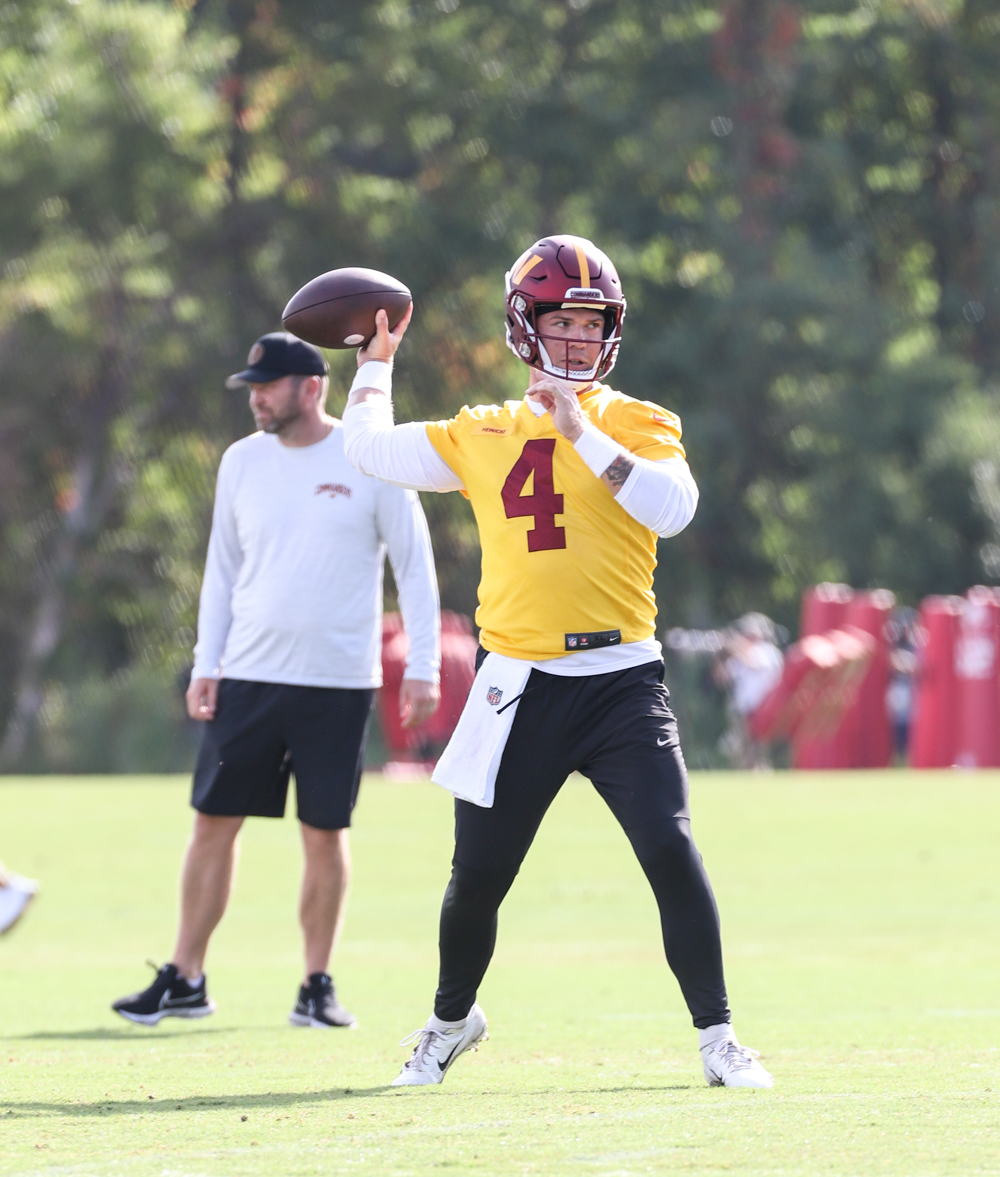 Quarterback Taylor Heinicke (4) prepares to make a throw at the
