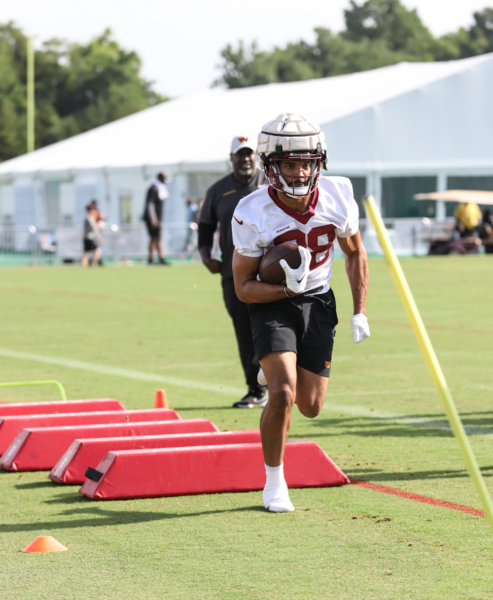 RB Reggie Bonofon (38) running the ball at the Commanders traini