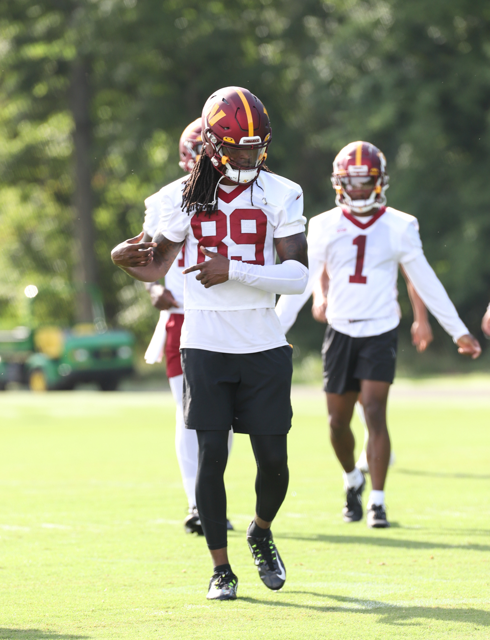 WR Cam Sims (89) dancing on the field at the Commanders training
