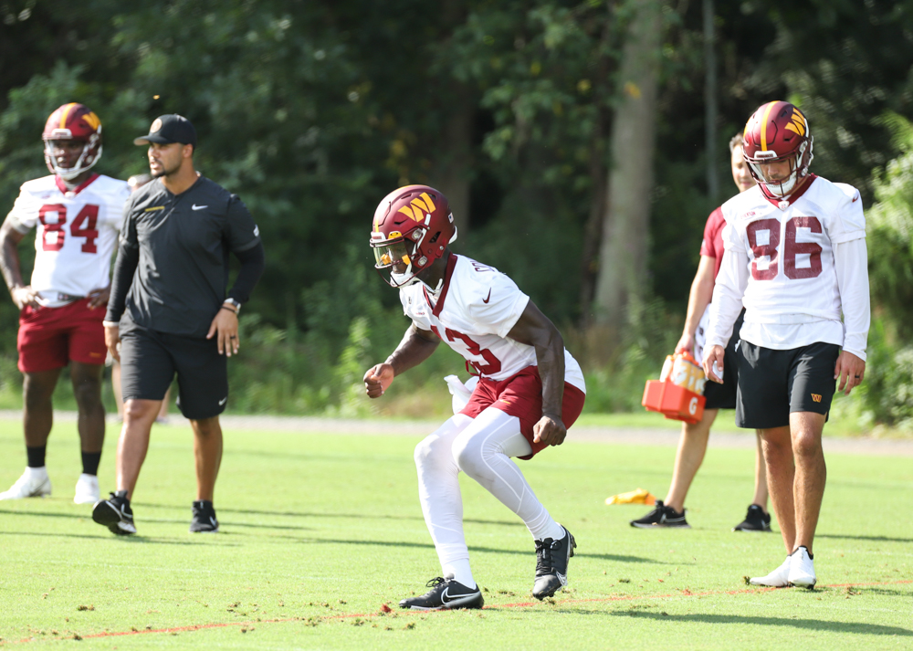 WR Kelvin Harmon (13) preparing to make a running play on the fi