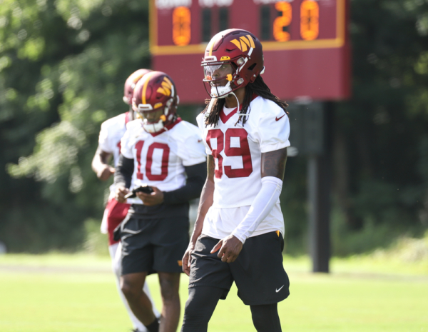 WR Cam Sims (89) listening to the coaches instruction for the ne