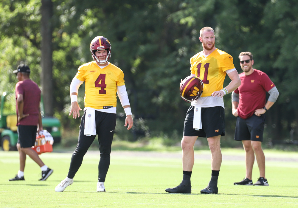 Quarterbacks Carson Wentz (11) and Taylor Heinicke (4) waiting f