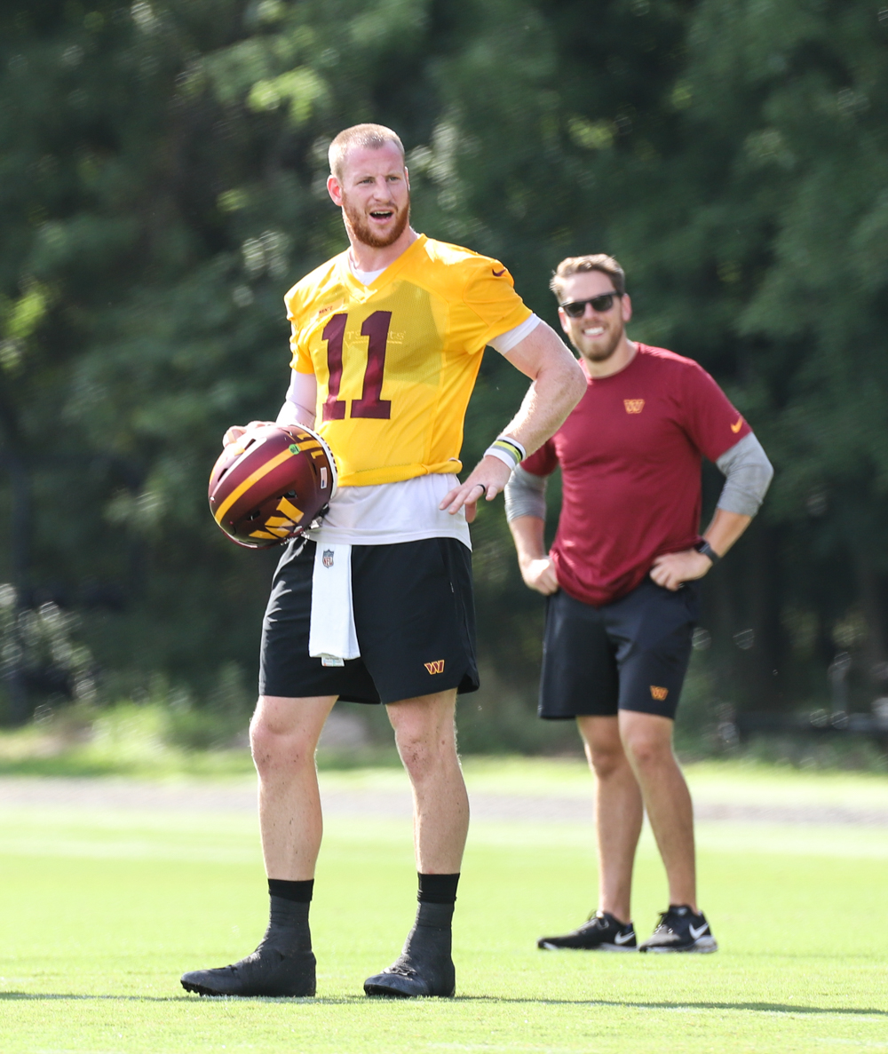 Quarterbacks Carson Wentz (11) waiting for to start the next set
