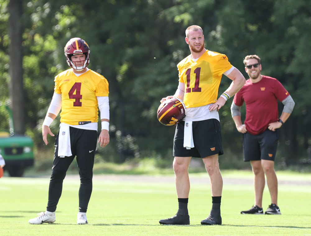 Quarterbacks Carson Wentz (11) and Taylor Heinicke (4) waiting f