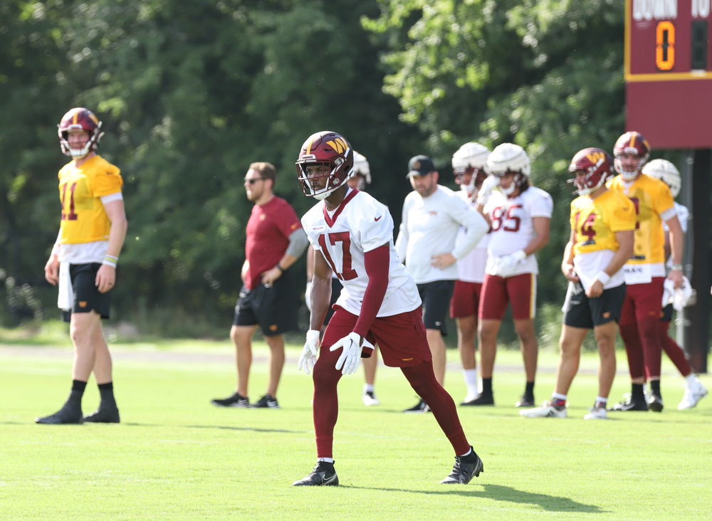 WR Terry McLaurin (17) set to make a running play on the field a
