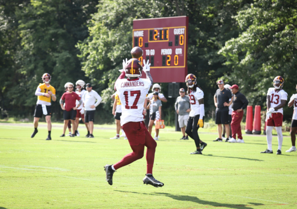 WR Terry McLaurin (17) about to make a catch from Wentz (4) at t