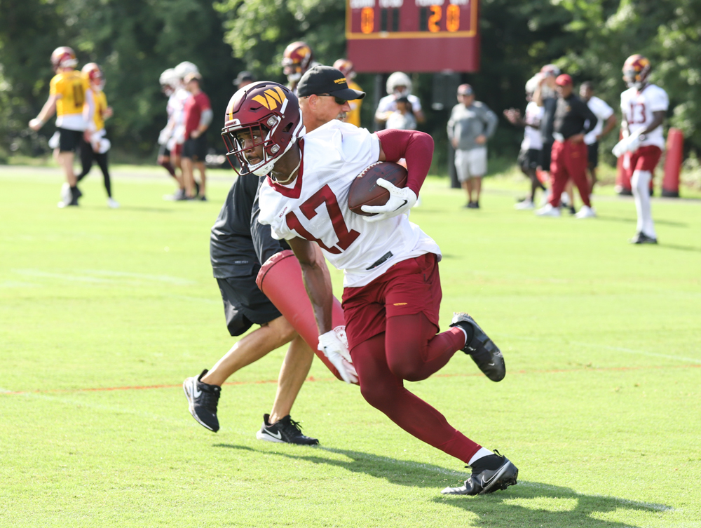 WR Terry McLaurin (17) follows through with the catch from Went