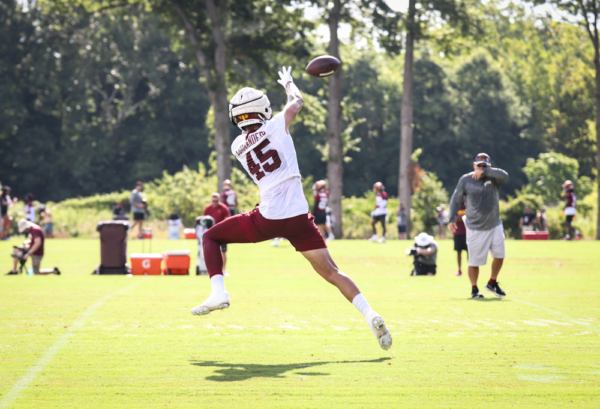 TE Curtis Hodges (45) leaps to make the catch the catch at the C