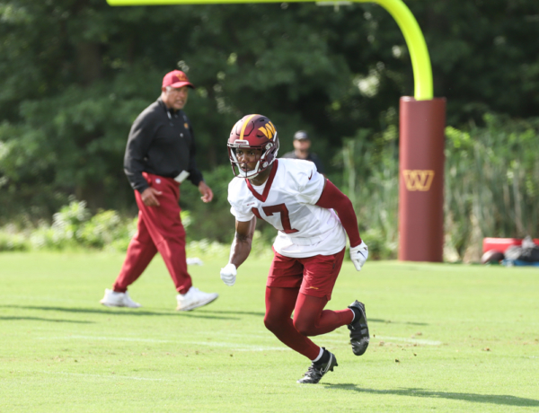 WR Terry McLaurin (17) begins to run, to catch the ball thrown