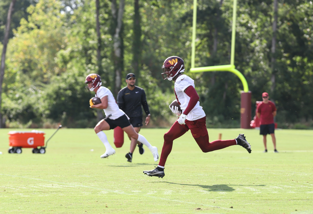 WR Terry McLaurin (17) makes the catch, runs with the ball at t