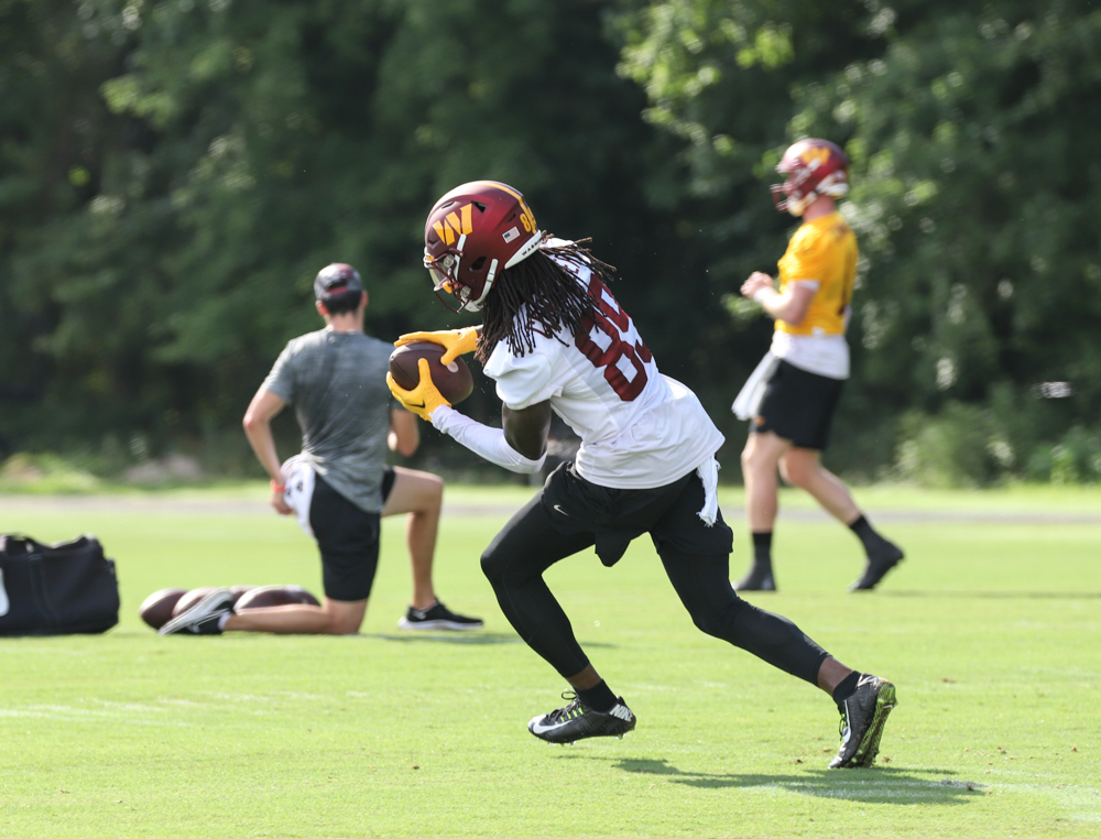 WR Cam Sims (89) makes the catch at the Commanders training cam