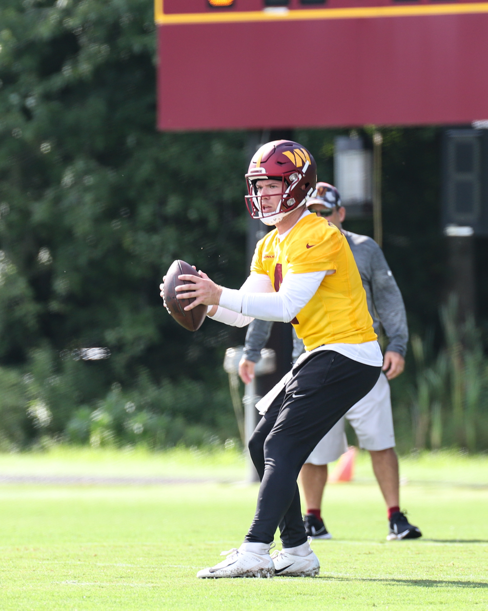 Quarterback Taylor Heinicke (4) prepares to make a throw at the