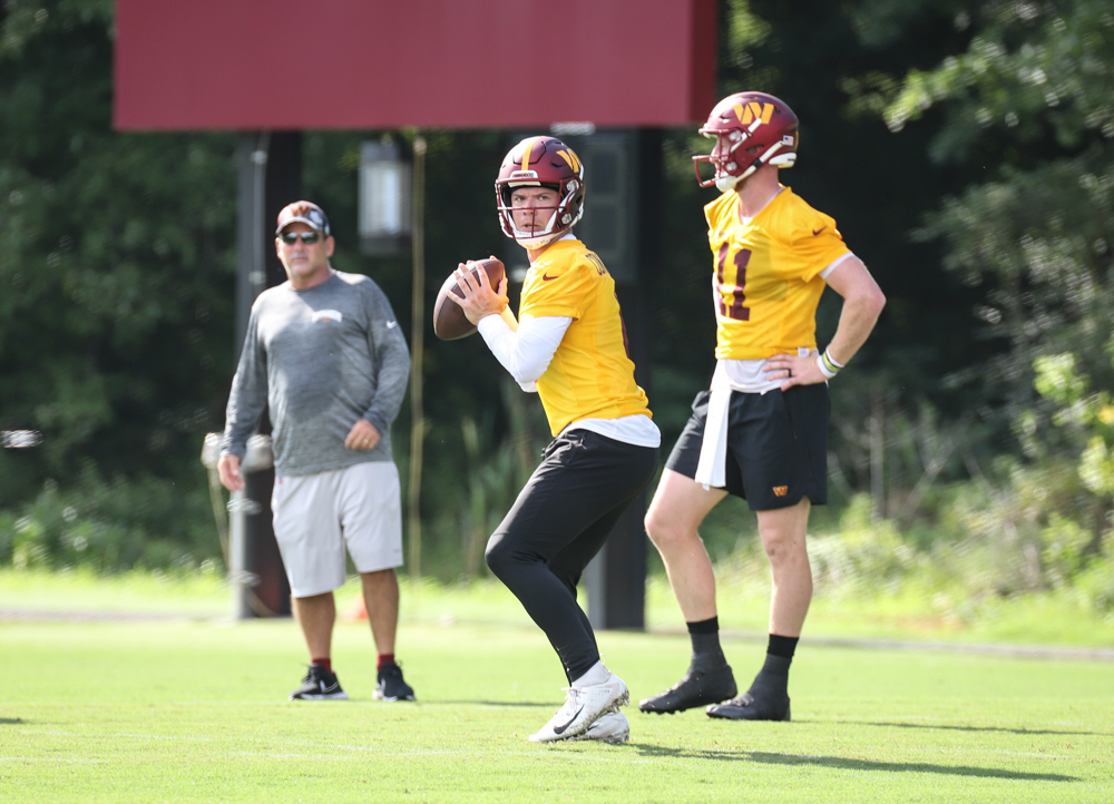 Quarterback Taylor Heinicke (4) prepares to make a throw at the