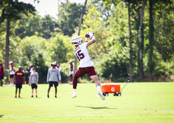 TE Curtis Hodges (45) makes a catch in the air at the Commanders
