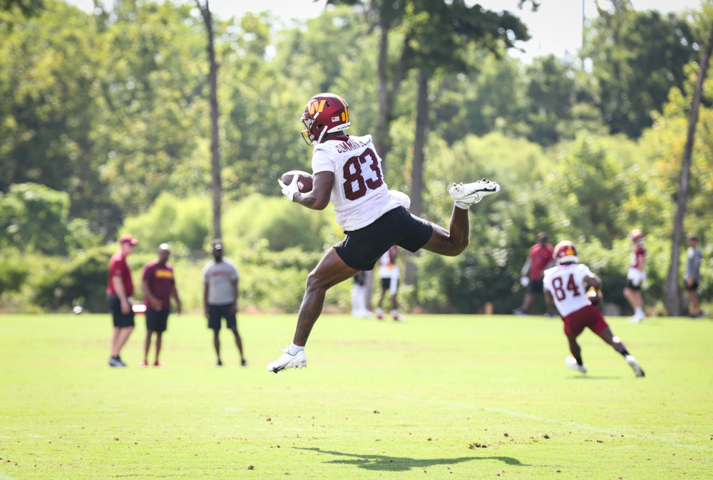 WR Kyric McGowan (83) leaps to make a catch the pass at the Comm