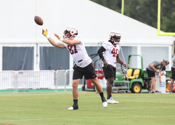 Tight End John Bates (87) making a catch before practice began w