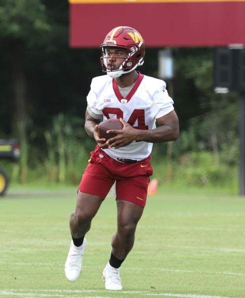 WR Jequez Ezzard (84) completing a catch during the Commanders