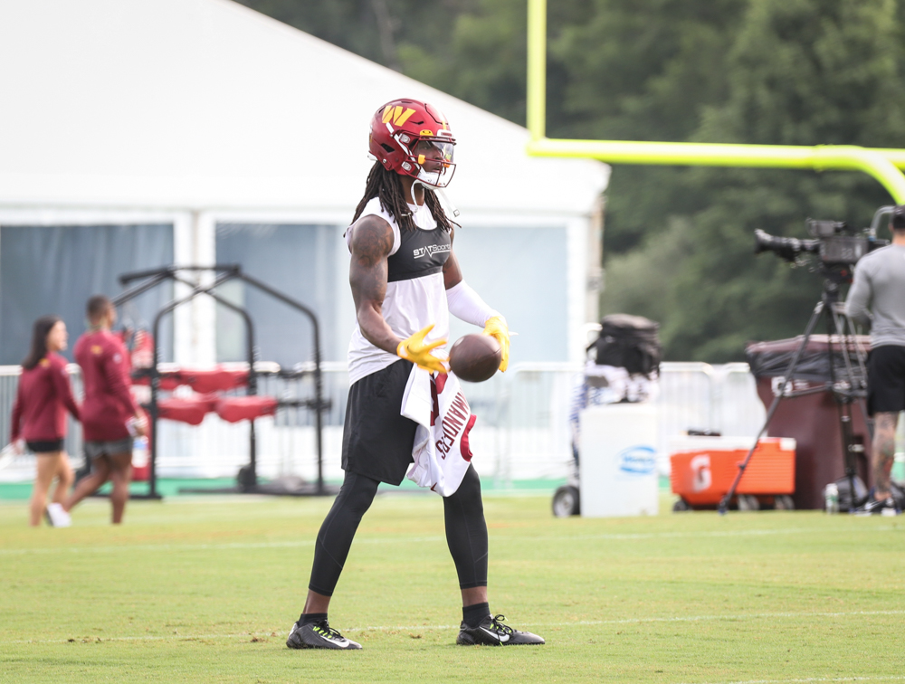 WR Cam Sims (89) catches the ball during the Commanders trainin