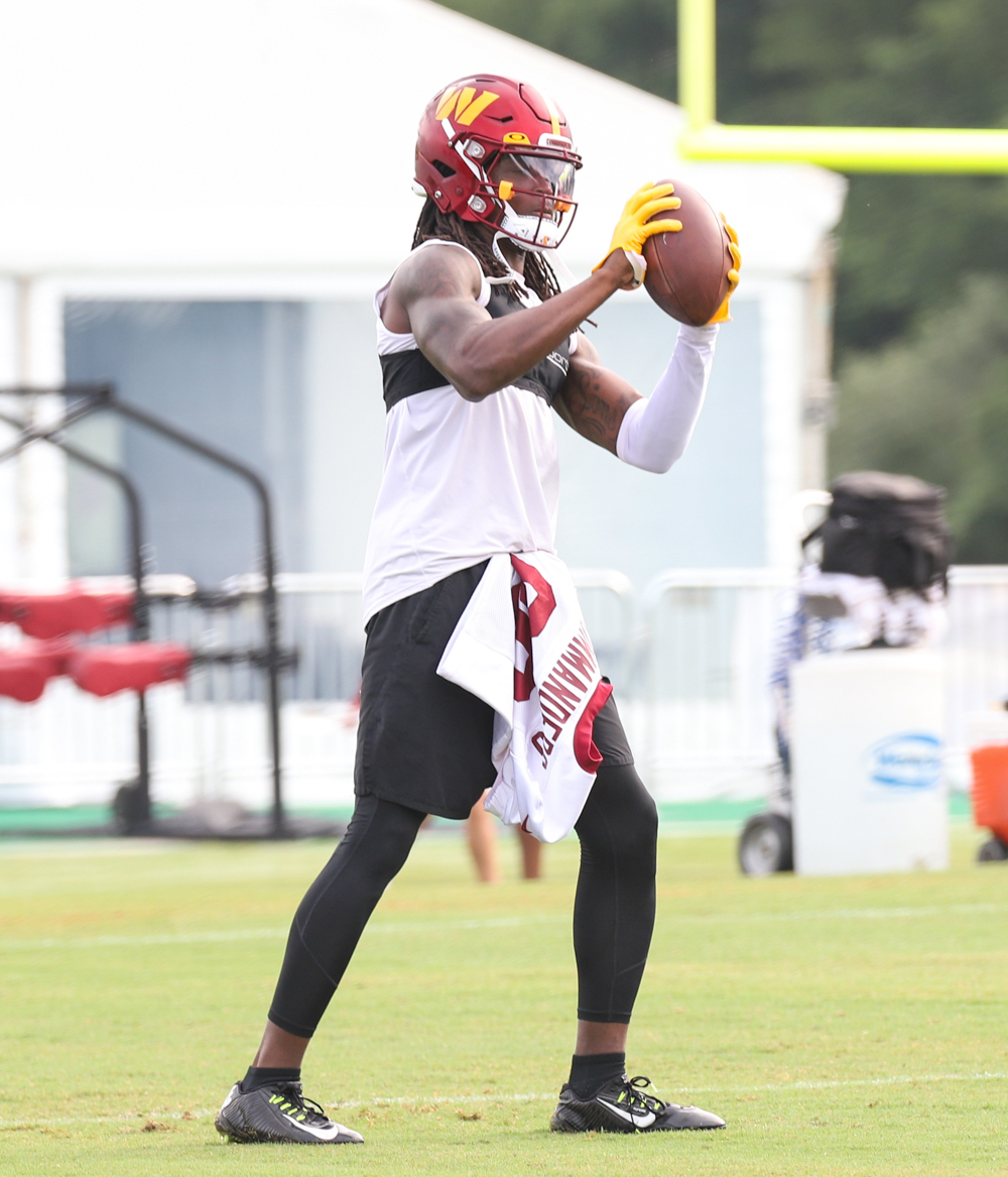 WR Cam Sims (89) makes a catch during the Commanders training c