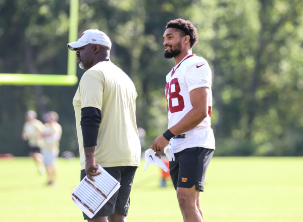 Washington Commanders Running Back Reggie Bonnafon (38) chatting