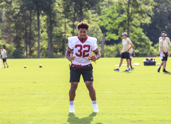 Washington Commanders Running Back, Jaret Patterson (32) stretch