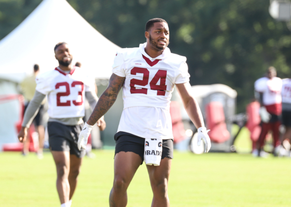 Washington Commanders Running Back Antonio Gibson (24) stretchin