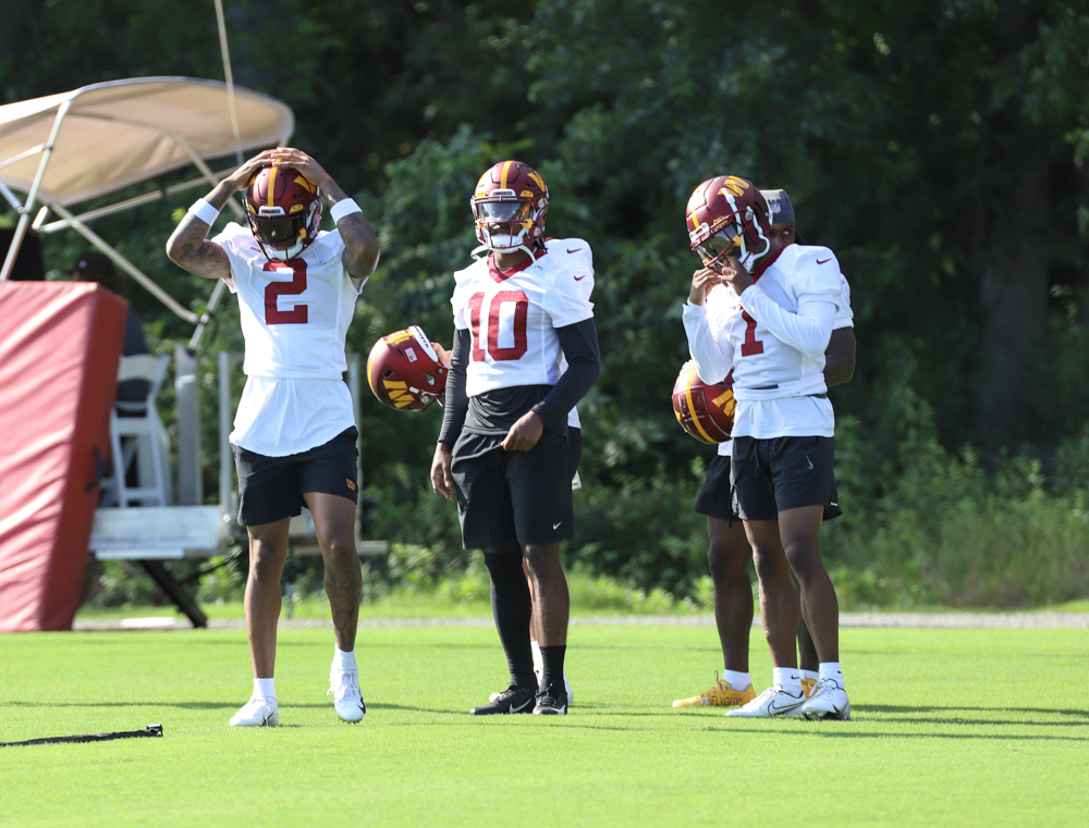 Washington Commanders' Dyami Brown (2), Jahan Dotson (1) and Cur
