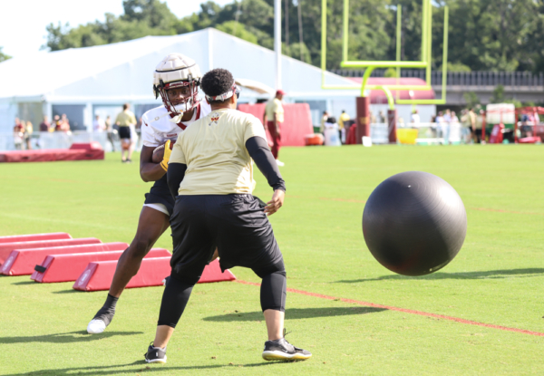 Washington Commanders Running Back Brian Robinson Jr. (8) runnin