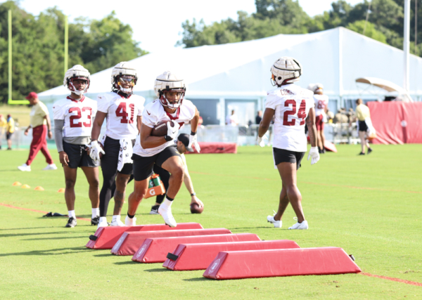 Washington Commanders Running Back Reggie Bonnafon (38) running