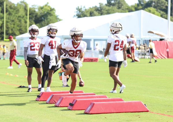 Washington Commanders Running Back Reggie Bonnafon (38) running