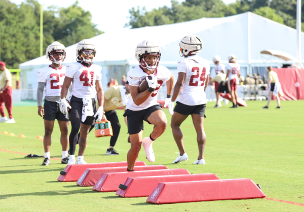Washington Commanders Running Back Reggie Bonnafon (38) running