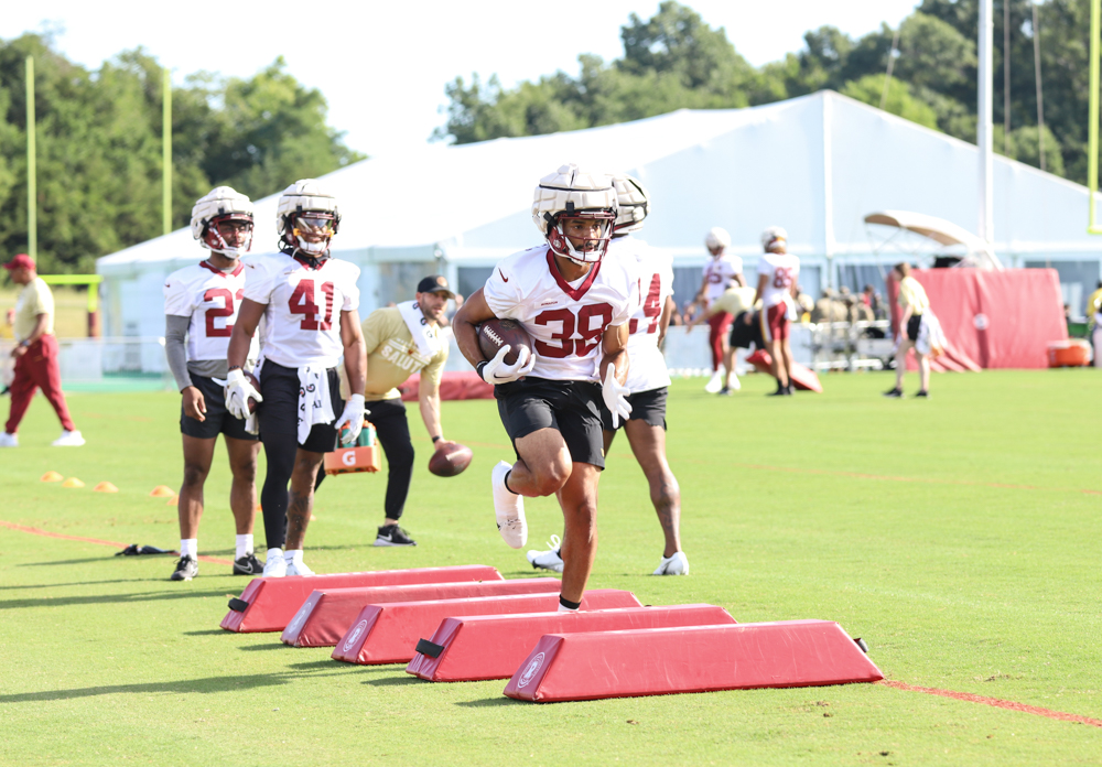 Washington Commanders Running Back Reggie Bonnafon (38) running