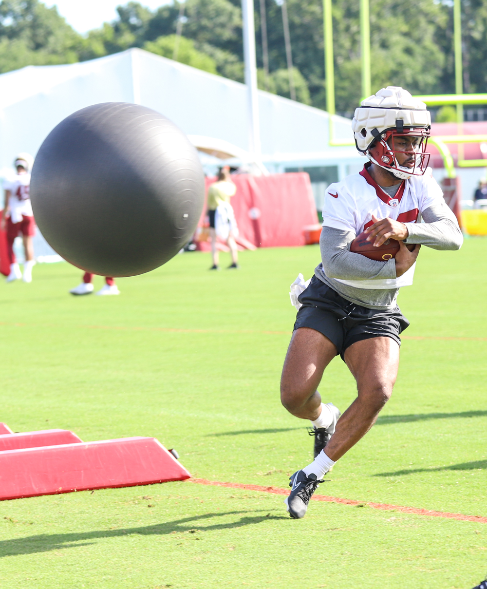 Washington Commanders Running Back J.D McKissic (23) avoiding th