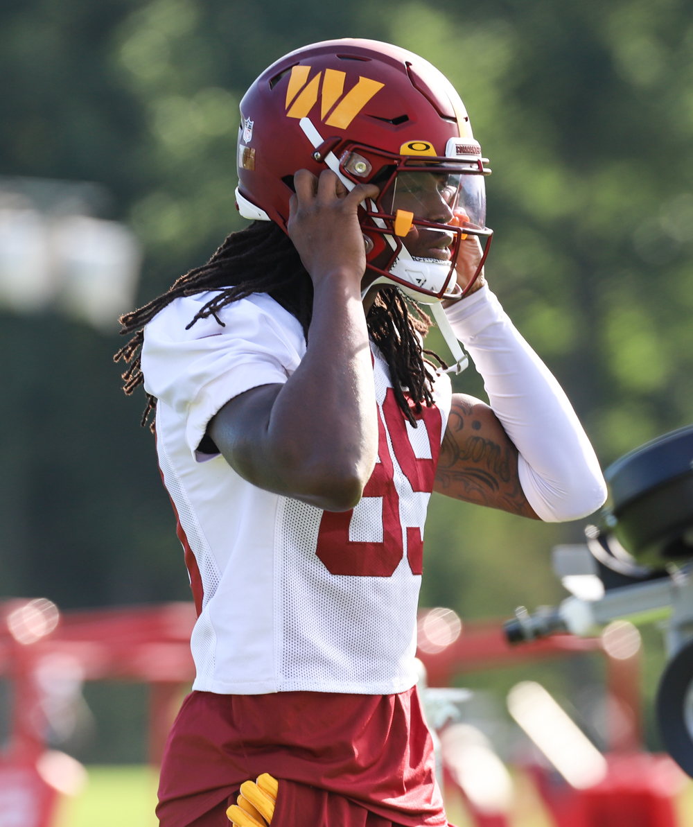 Washington Commanders Wide Receiver, Cam Sims (89) taking the fi