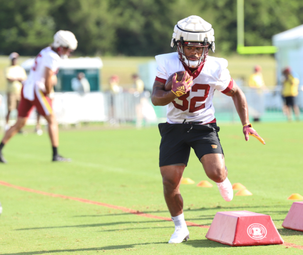 Washington Commanders Running Back Jaret Patterson (32) finishin
