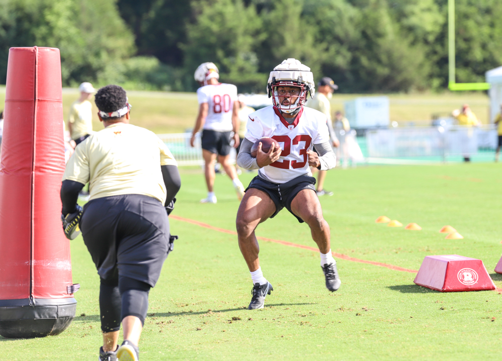 Washington Commanders Running Back J.D. McKissic (23) making mov