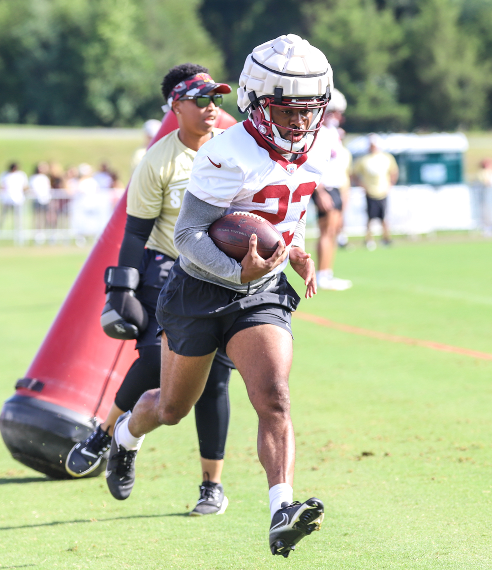 Washington Commanders Running Back J.D. McKissic (23) carrying t