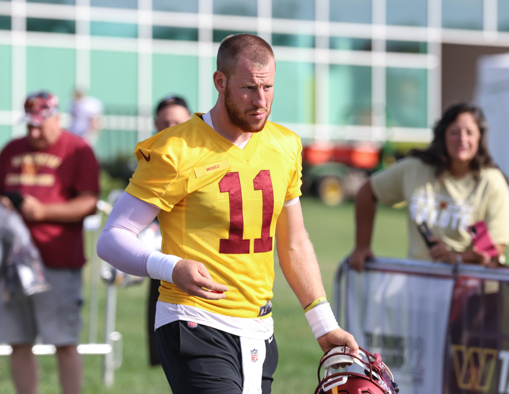 Washington Commanders Quarterback Carson Wentz (11) taking the f