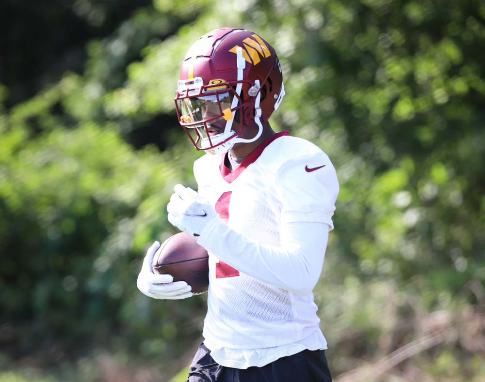 Washington Commanders Wide Reciever Jahan Dotson (1) makes his w